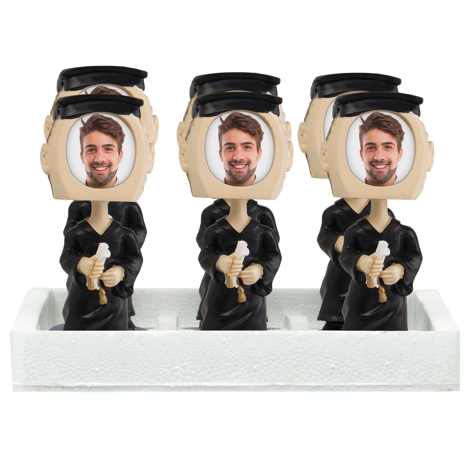 A package of 6 graduation photo bobble heads wearing a cap and gown and holding a diploma.