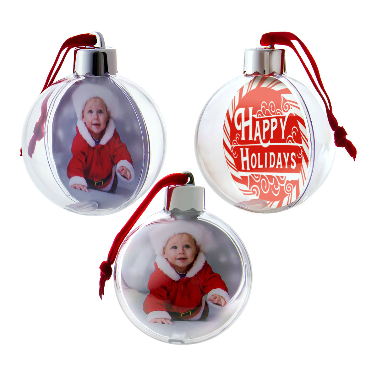 Three clear, round Christmas ornaments with red velvet hanger ribbons, shown at various angles on a white background.