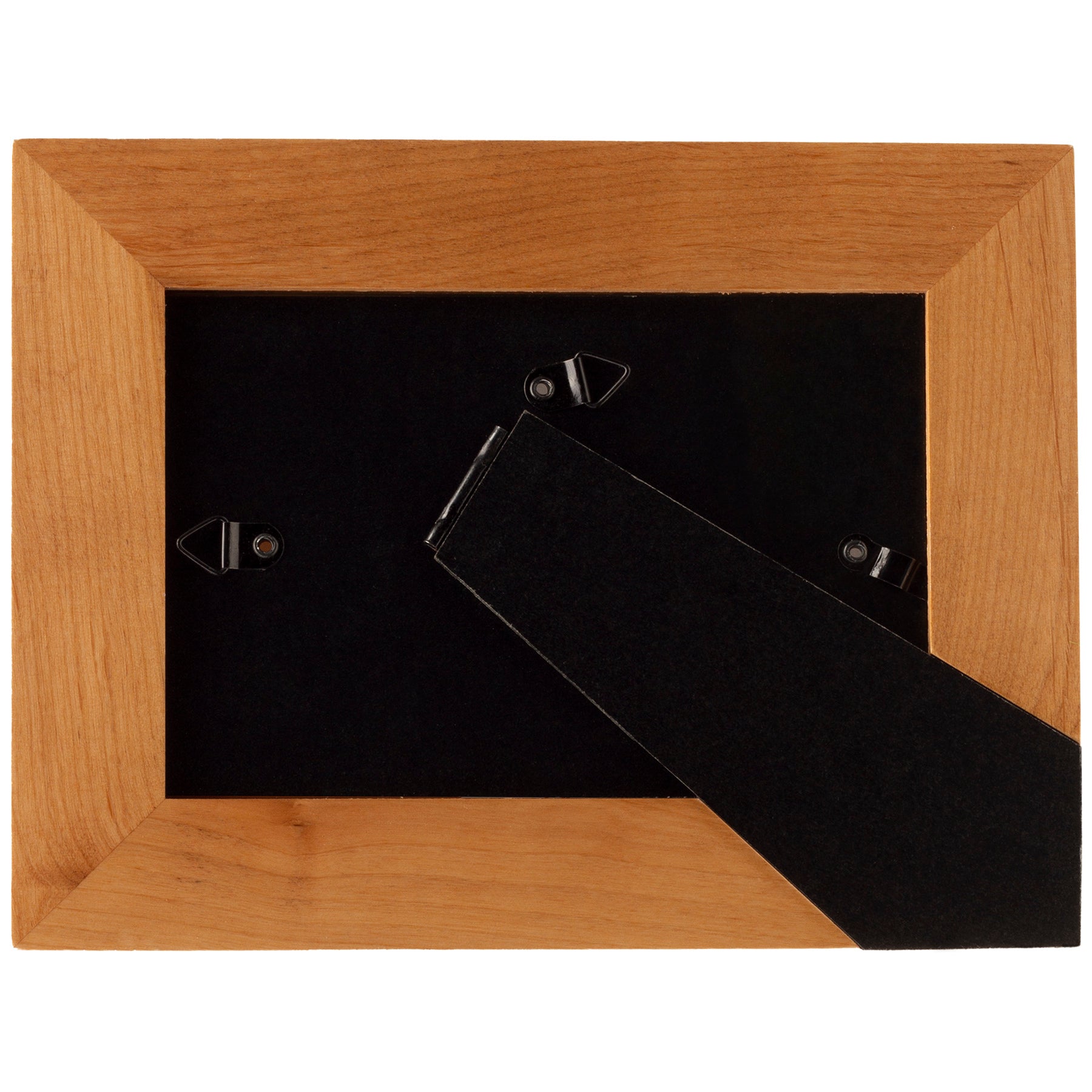 Backside of a brown wood picture frame showing the black easel and triangle hooks.