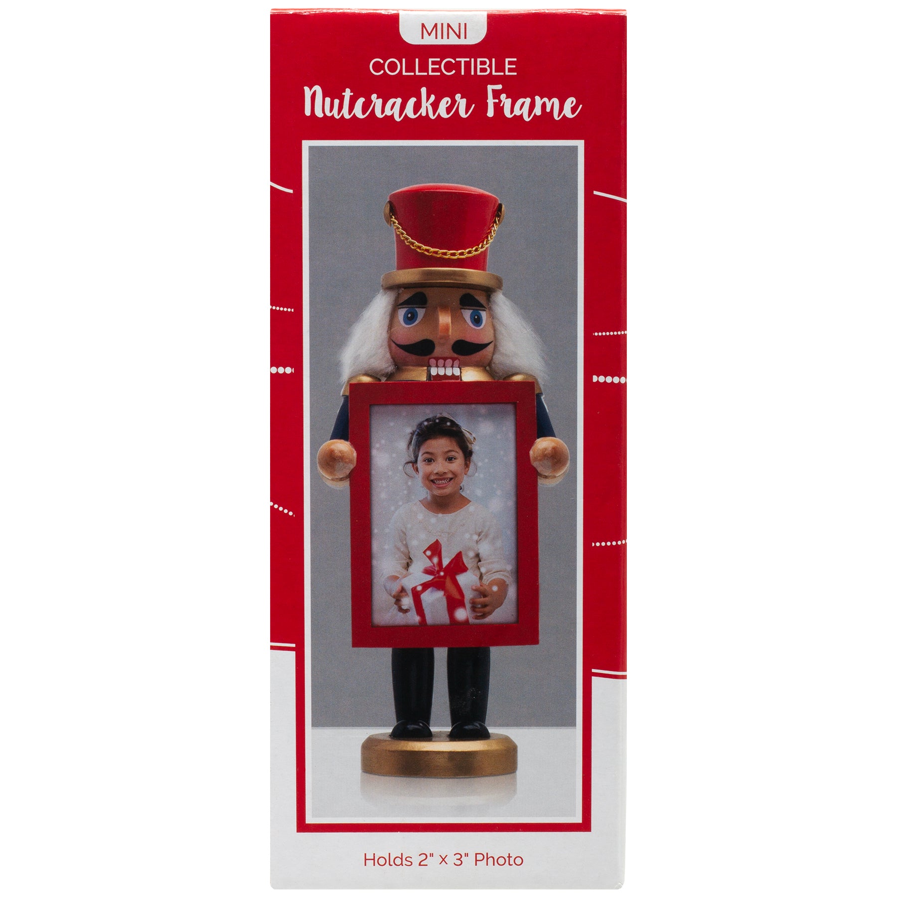A hand-painted mini photo nutcracker with a gold base, dressed in a navy blue coat with gold accents, red pants, and black boots, holding a photo frame in a full-color gift box.