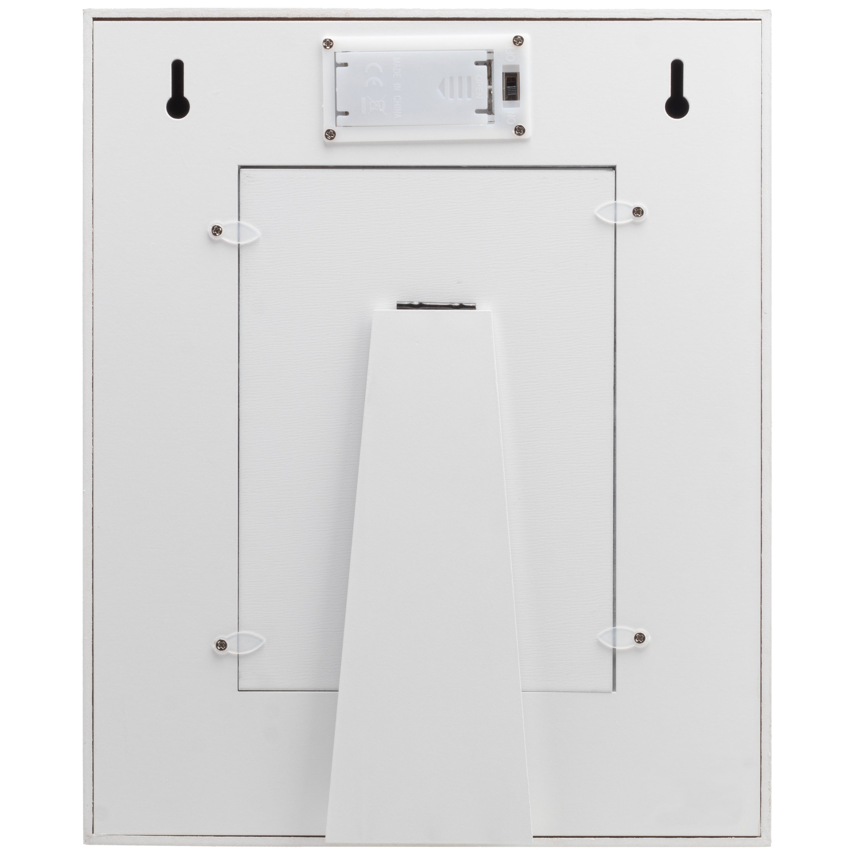Backside of a white wood picture frame showing the easel for tabletop display, the wall mounts to hang on the wall, and the battery box for the LED lights.