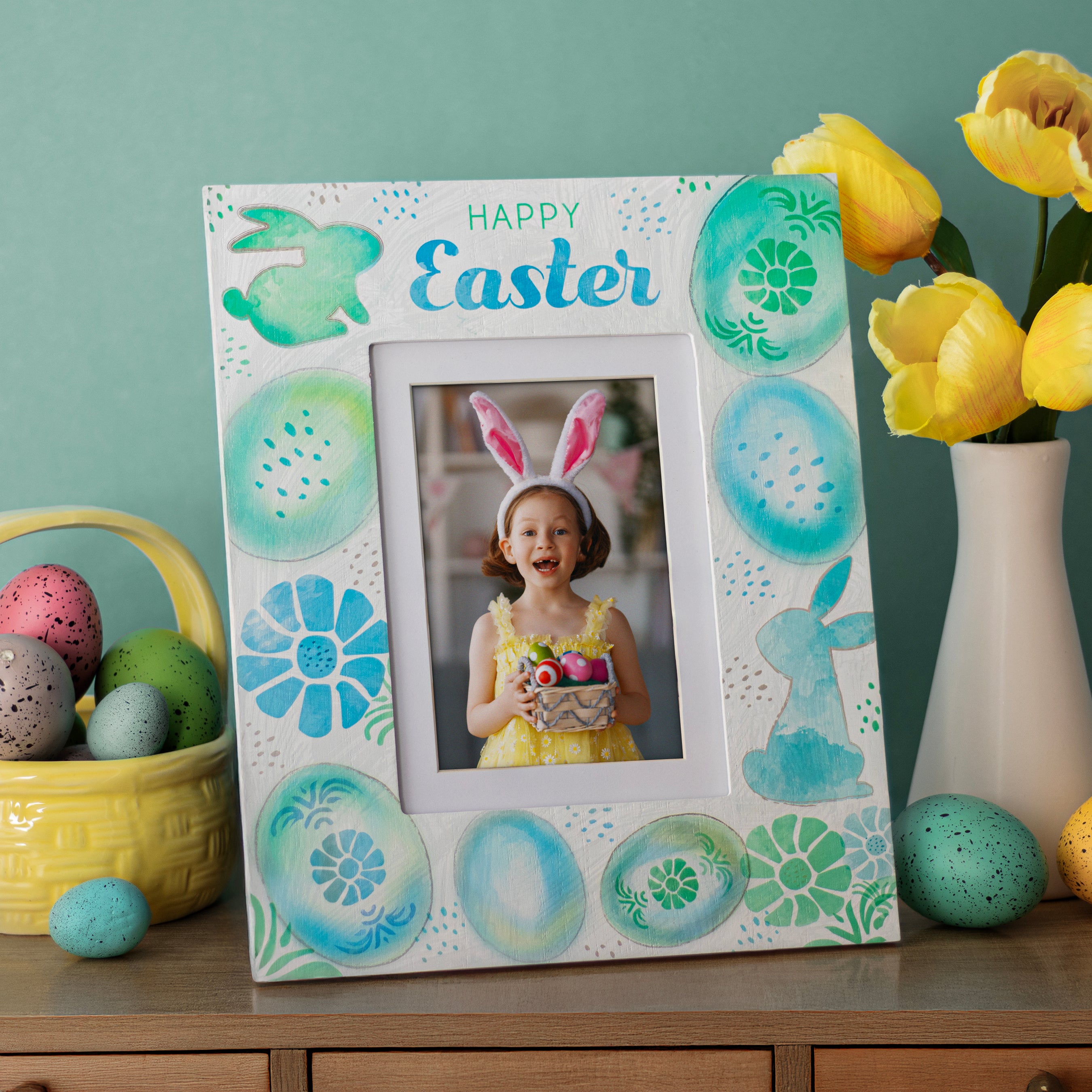 A wooden picture frame with blue. green, and teal spring designs and Happy Easter messaging.