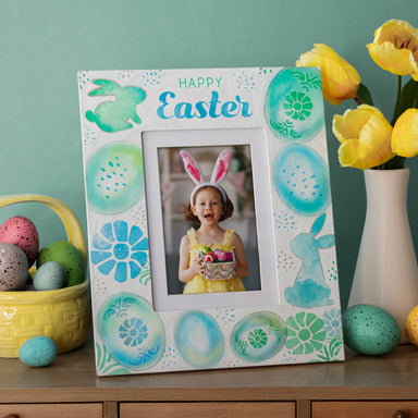 A wooden picture frame with blue. green, and teal spring designs and Happy Easter messaging.