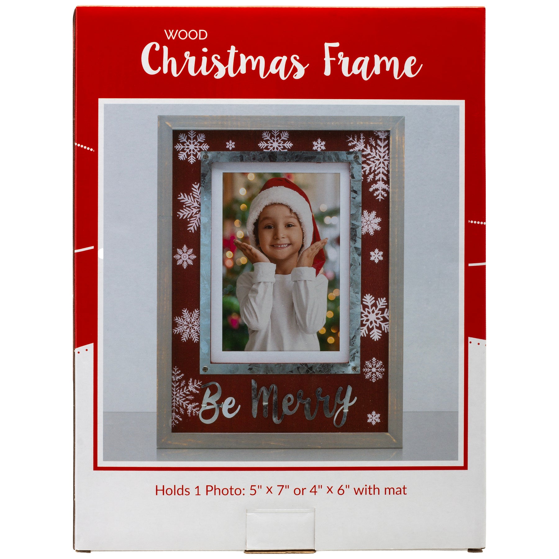 A Christmas-themed wooden picture frame with a gray border and reddish/brown insert. It features white snowflakes in varying sizes in the background and the phrase 'Be Merry' in silver at the bottom packaged in a full-color gift box.