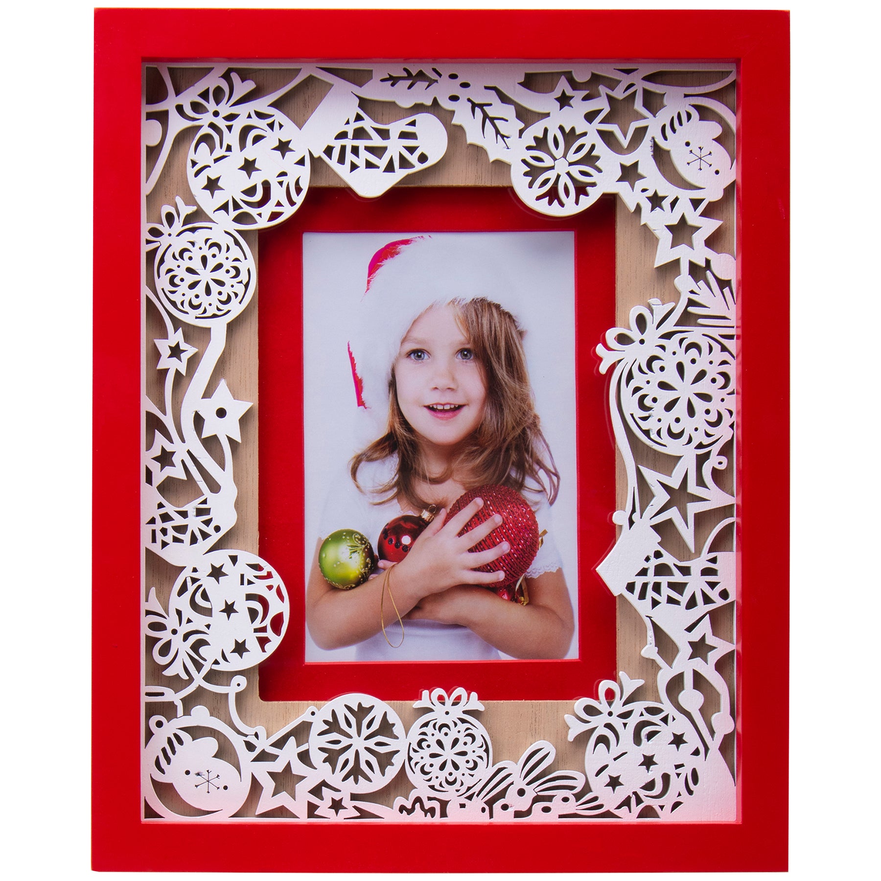 A red and white Christmas-themed laser cut picture frame with ornaments and a photo of a child wearing a Santa hat holding a Christmas tree.