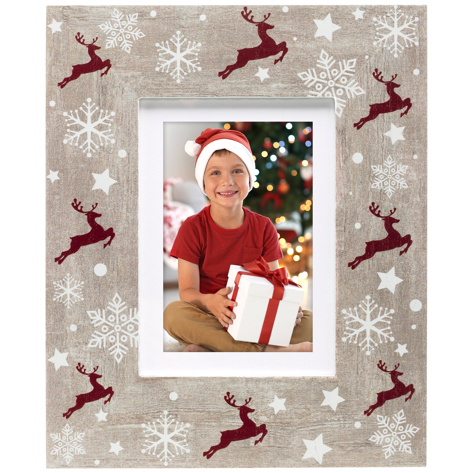 A rustic wooden picture frame with a reindeer and Christmas-themed pattern, displaying a photo of a person wearing a Santa hat.