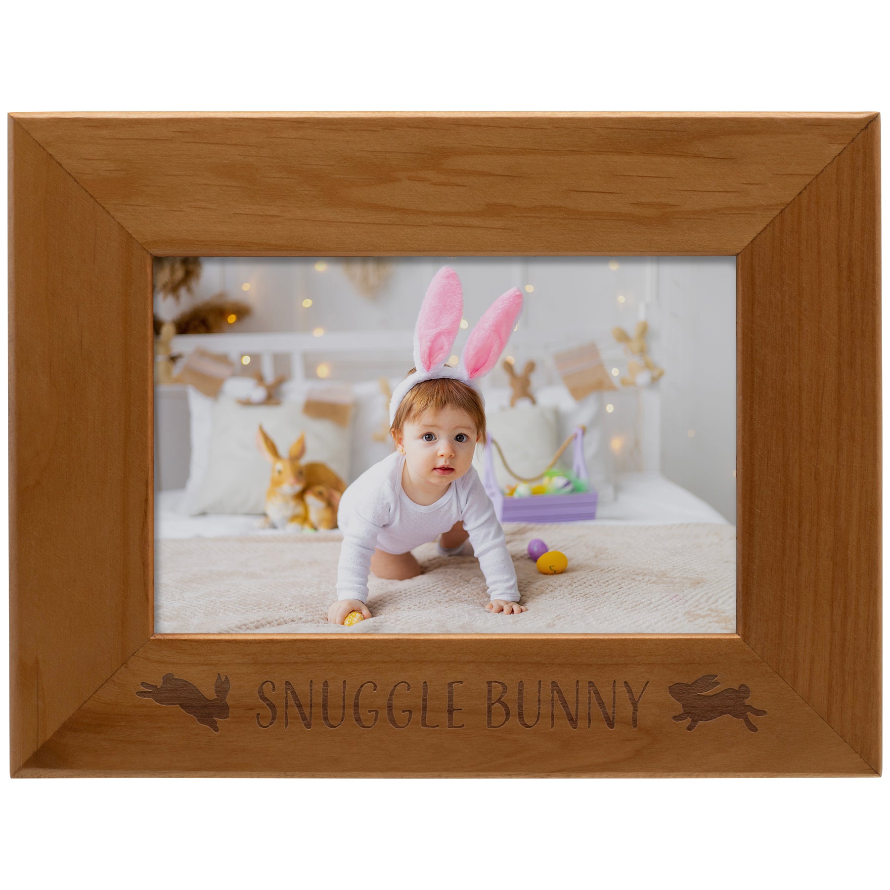 Wooden photo frame with a child wearing bunny ears and the text 'Snuggle Bunny'.
