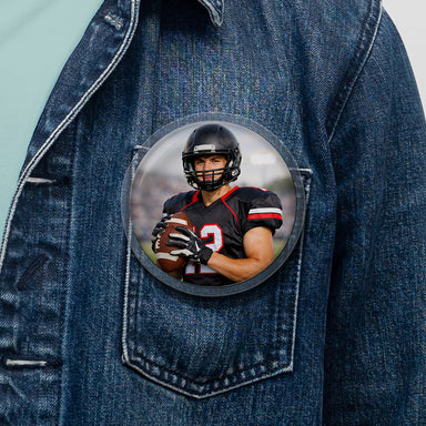 A circular DIY custom photo button with pin back. Used by professional youth sports photographers for photo packages. Sold in bulk at wholesale prices.